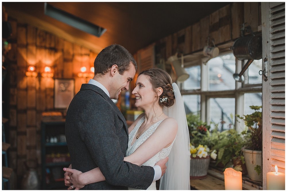  Bride and groom in the potting shed at the Roebuck Inn Mobberley, Cheshire. 
