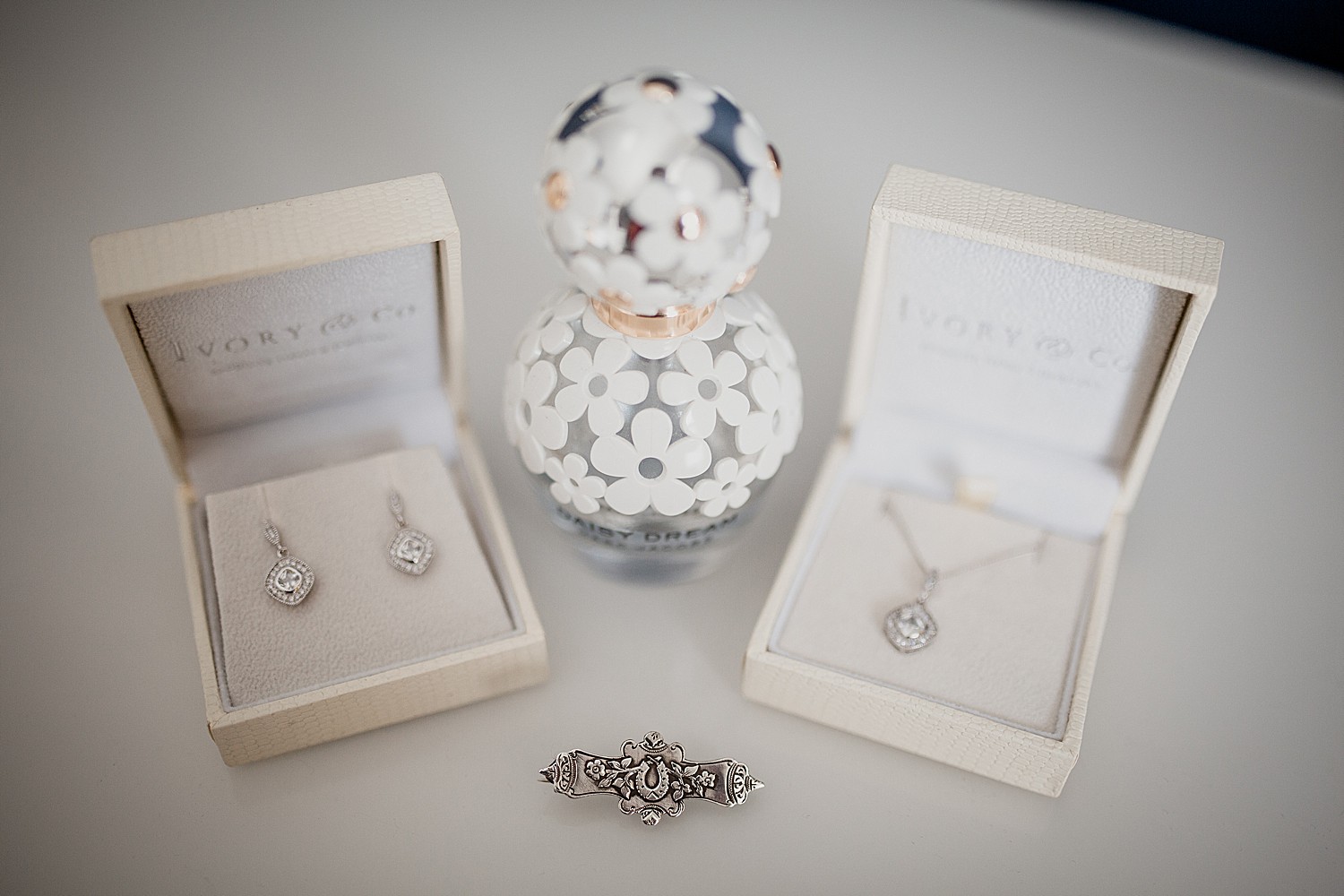 Jewellry, perfume and broach for Liverpool wedding