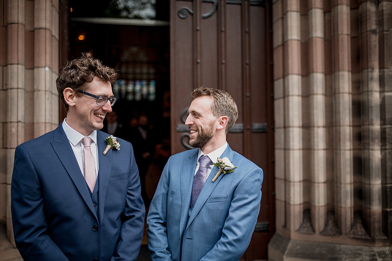 Groom and best man outside church