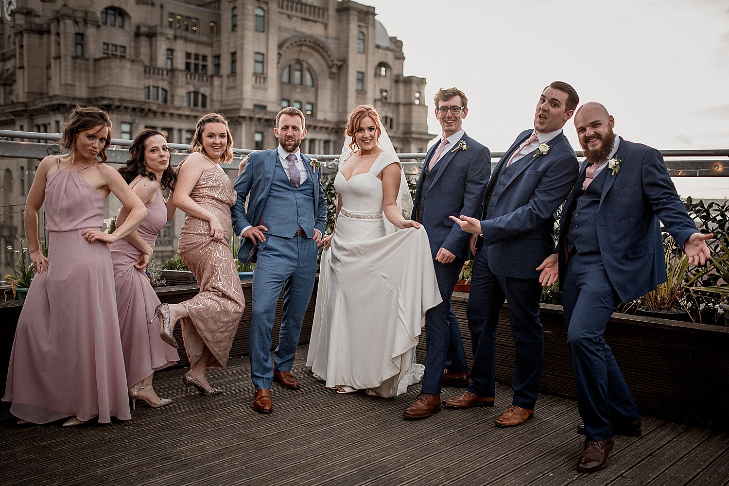 The bridal party pose on the roof terrace at Oh Me Oh My