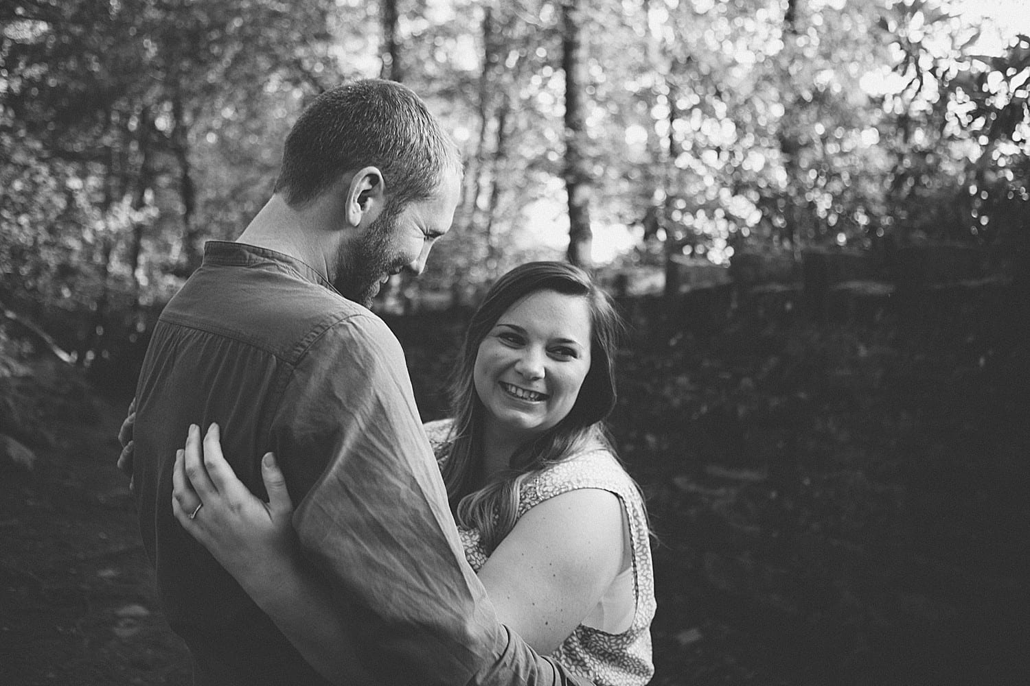 engaged couple laughing