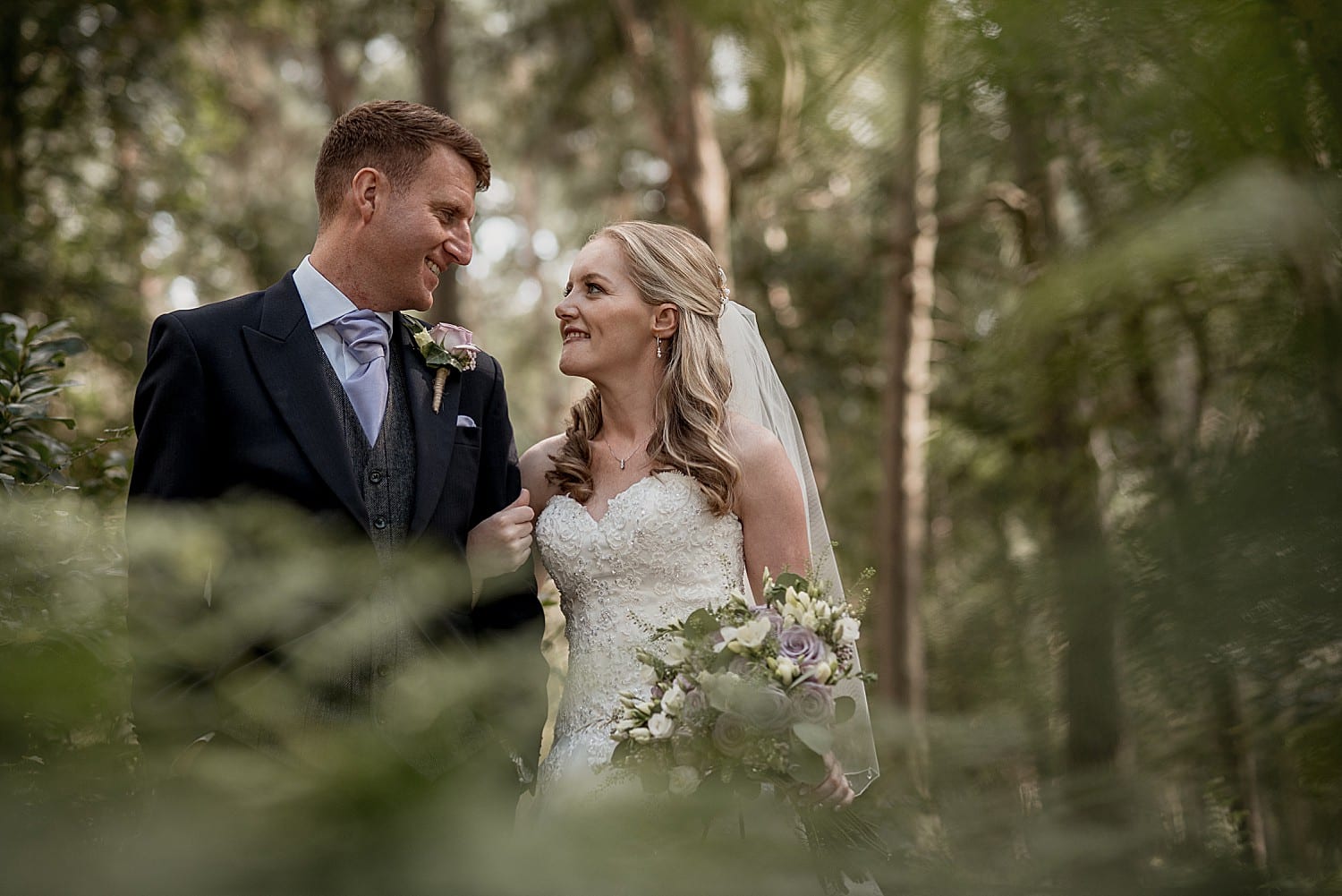 bride and groom in woods at abbeywood estate