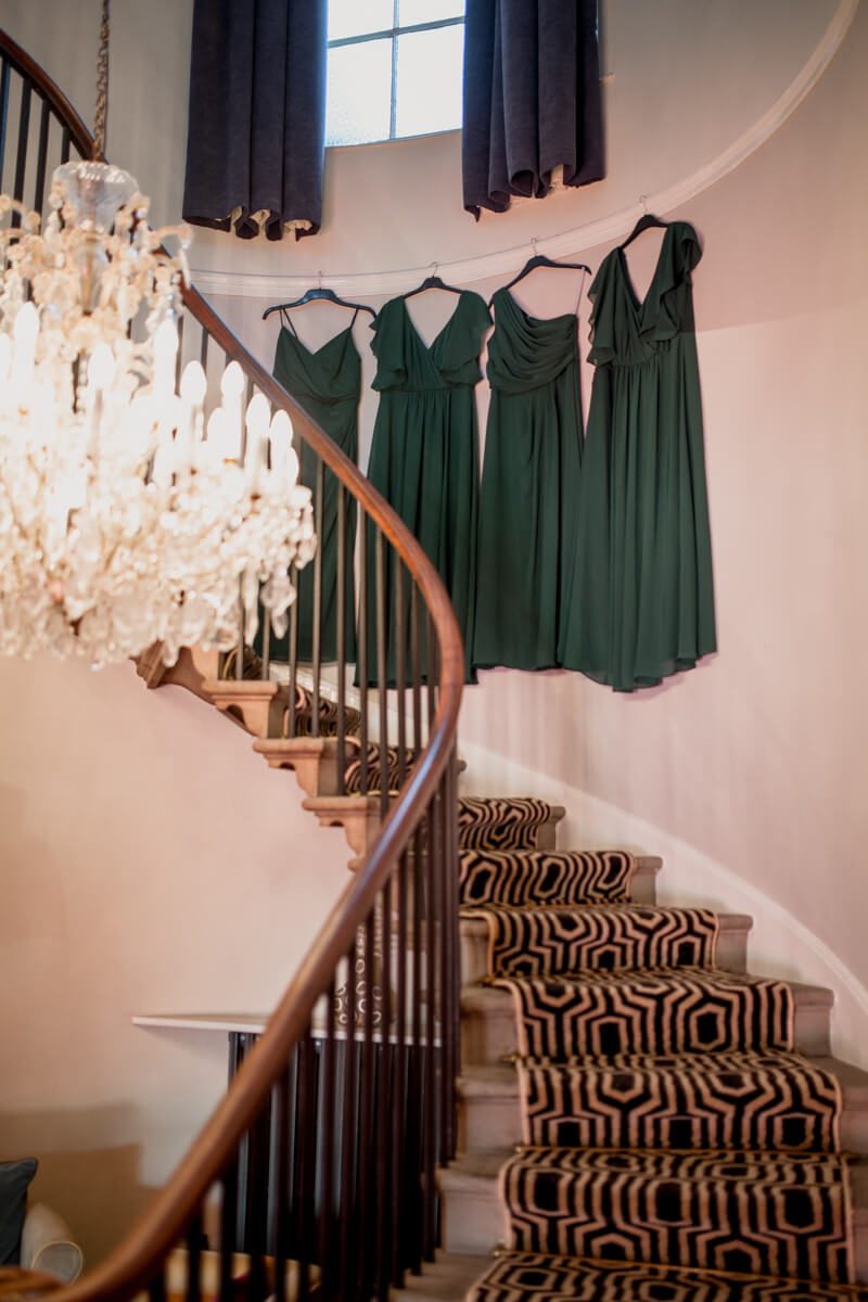 bridesmaid dresses on the staircase at rossett hall
