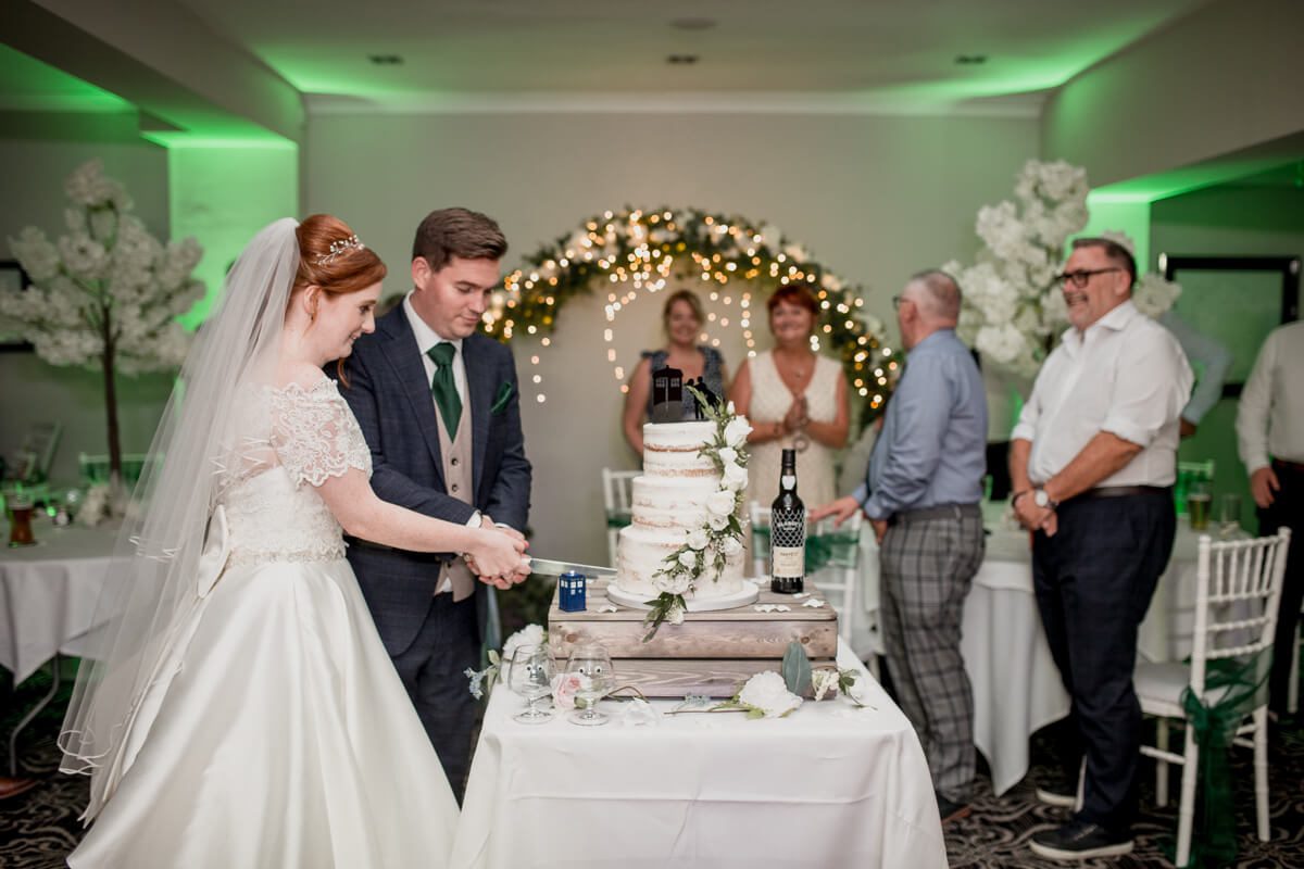 cake cutting at rossett hall wedding