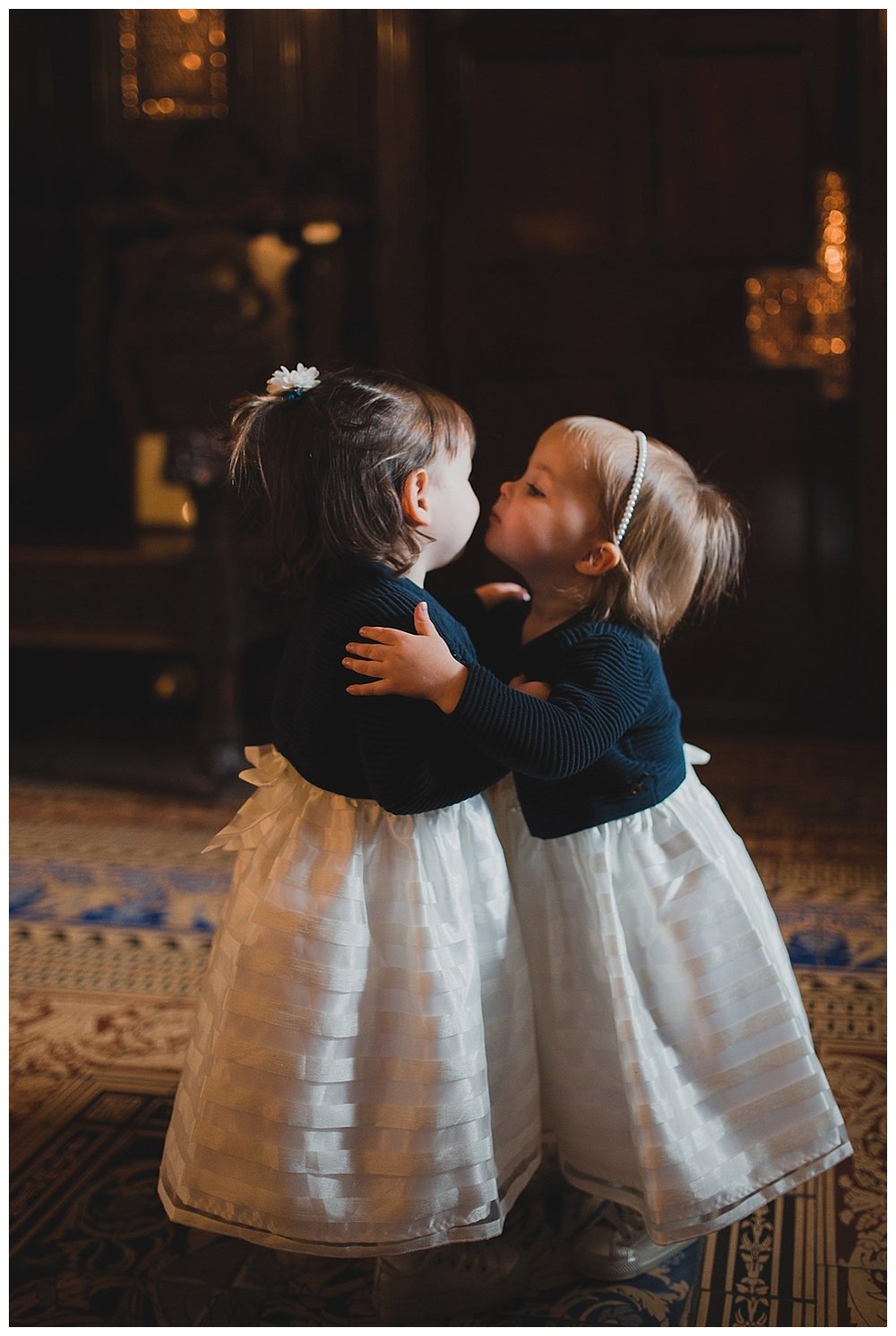  The cutest little flower girls in striped dresses with little cardigans. At Liverpool Town Hall. 