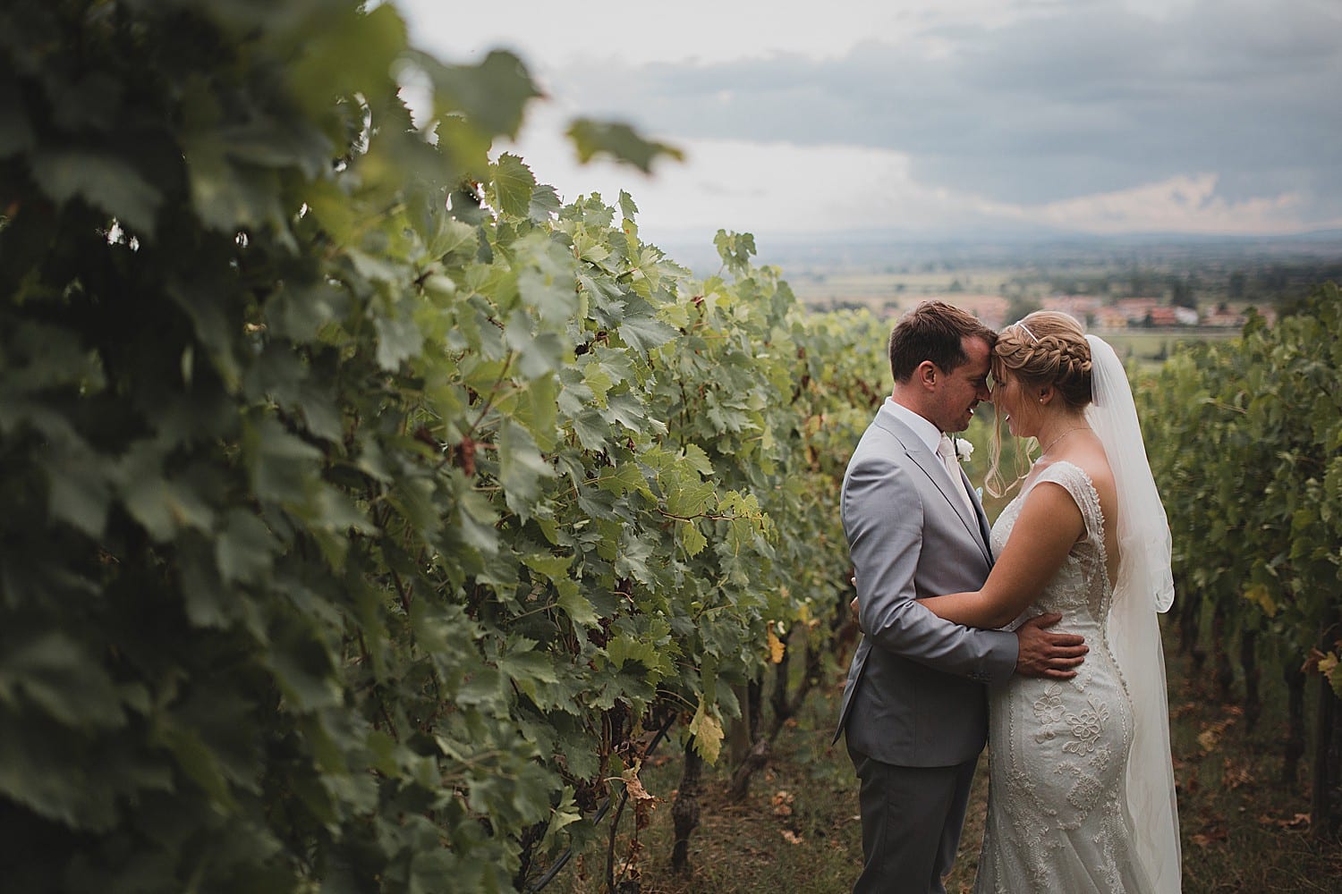 Bride and groom in Tuscany vineyard